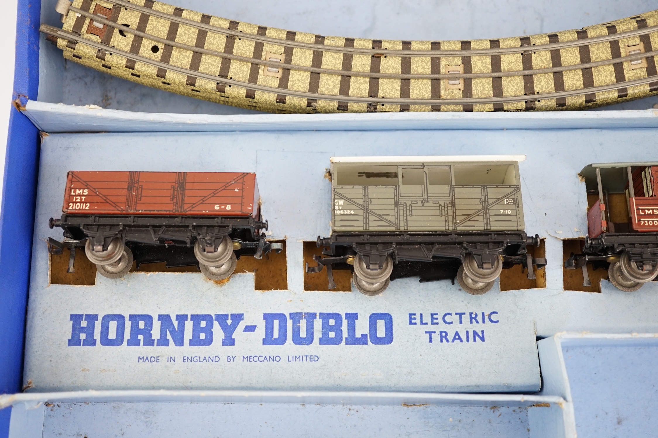 A collection of Hornby Dublo railway for 3-rail running, including; a boxed EDG7 Tank Goods Train set comprising an LMS Class N2 0-6-2 locomotive, 6917, freight wagons and track sections